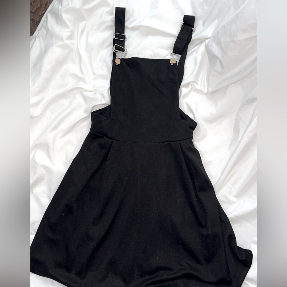 Small black overall dress